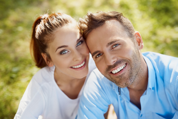 smiling couple after digital smile design