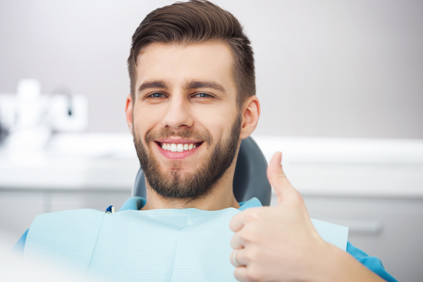 man at a dental hygiene appointment