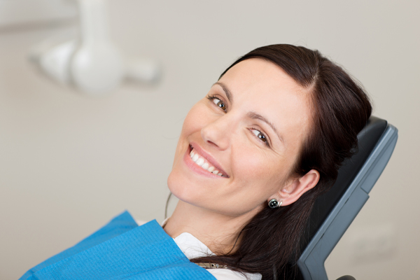 smiling woman at dentist