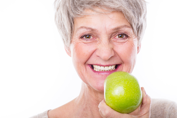 woman with an apple