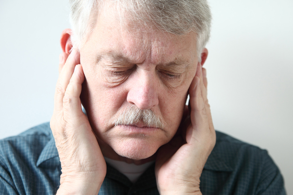 man with ear pain