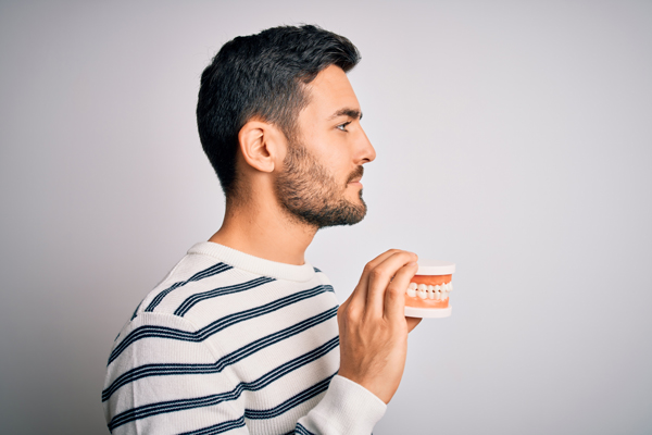 profile of man with dentures