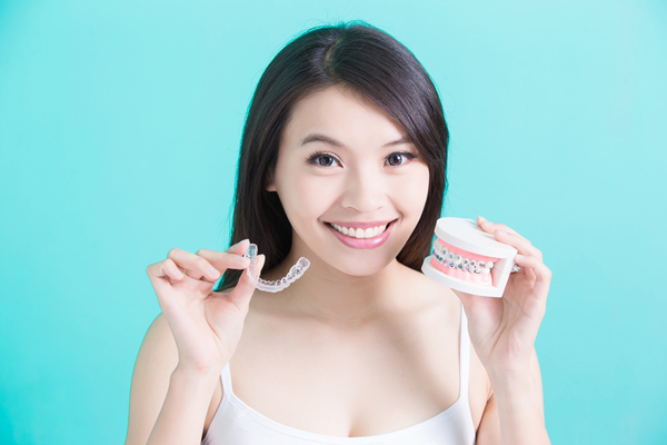 girl with orthodontic aligner