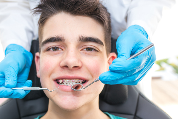 man with orthodontic braces