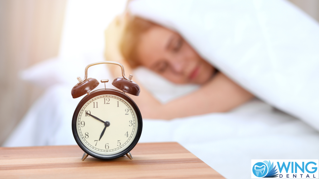 A woman sleeping in bed.
